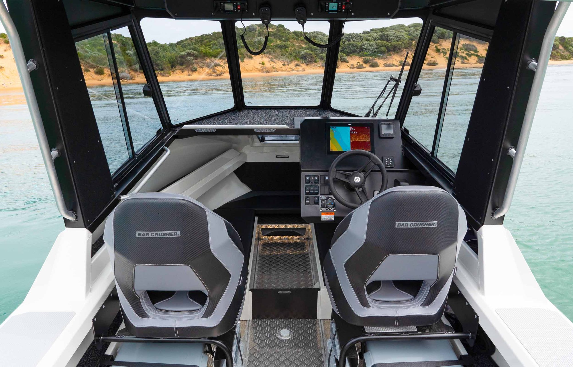 Bar Crusher 670HT helm seating and cabin